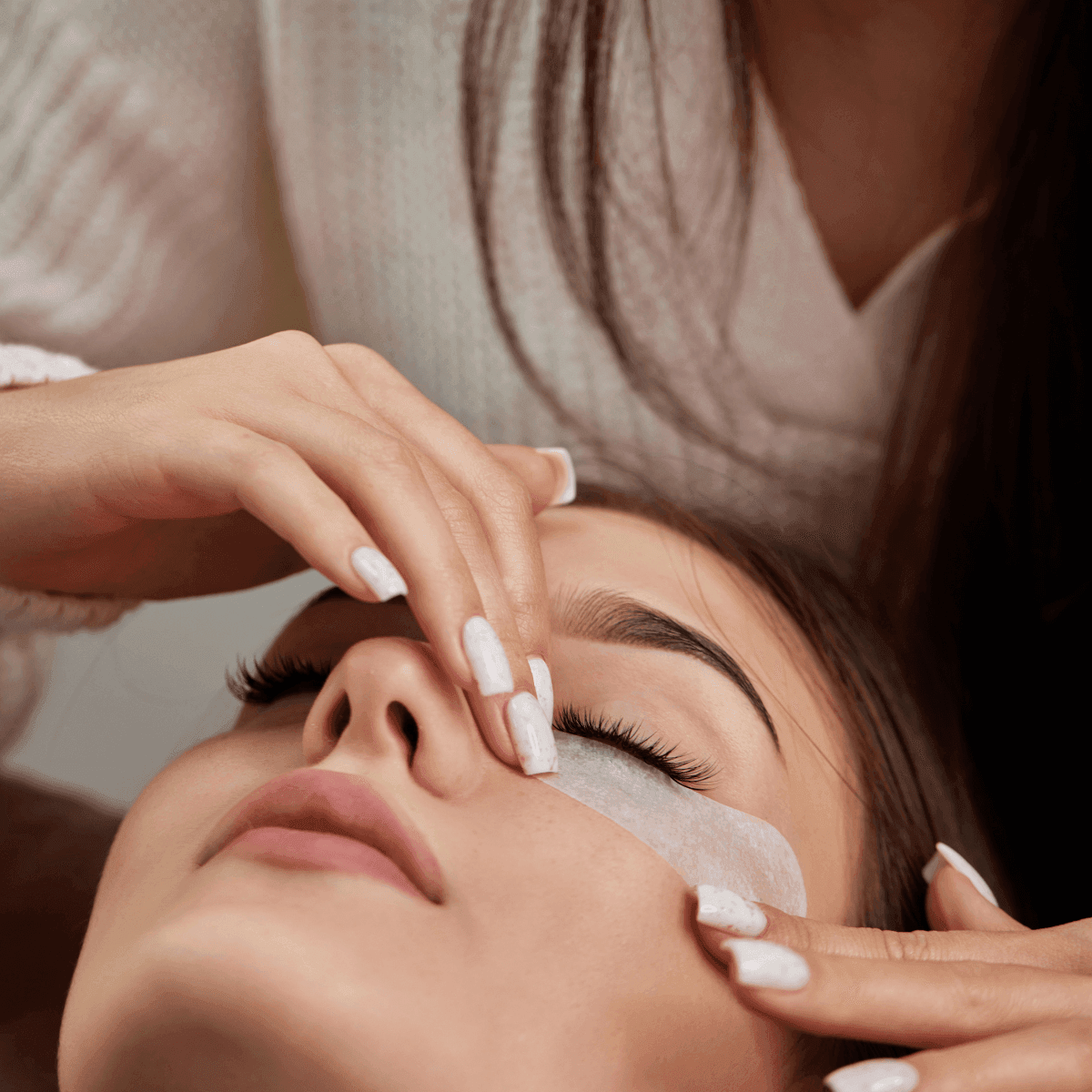 woman getting undereye skincare treatment