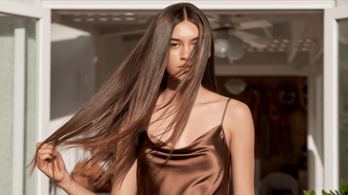 young woman with very long shiny dark long hair