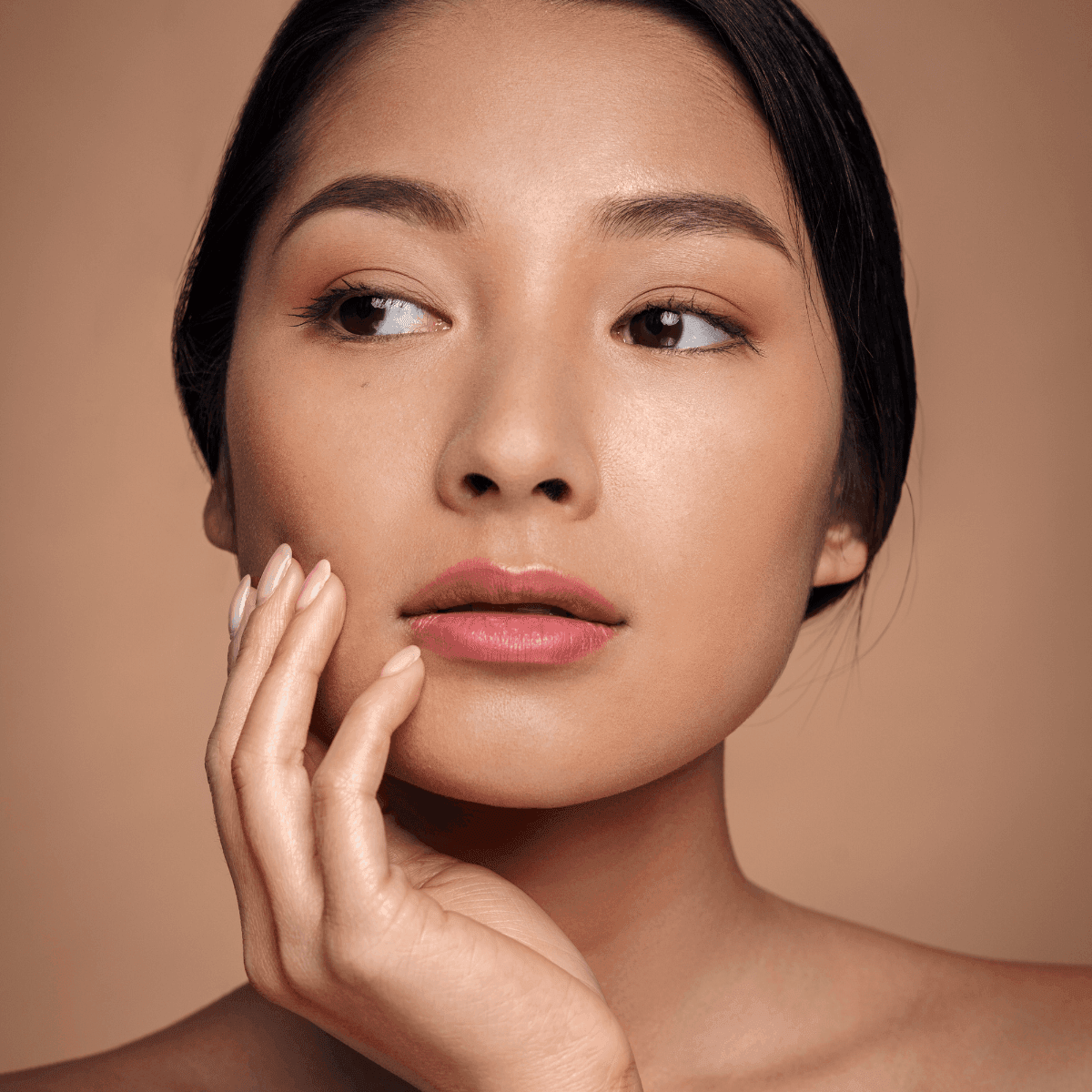 woman with glowing youthful skin 