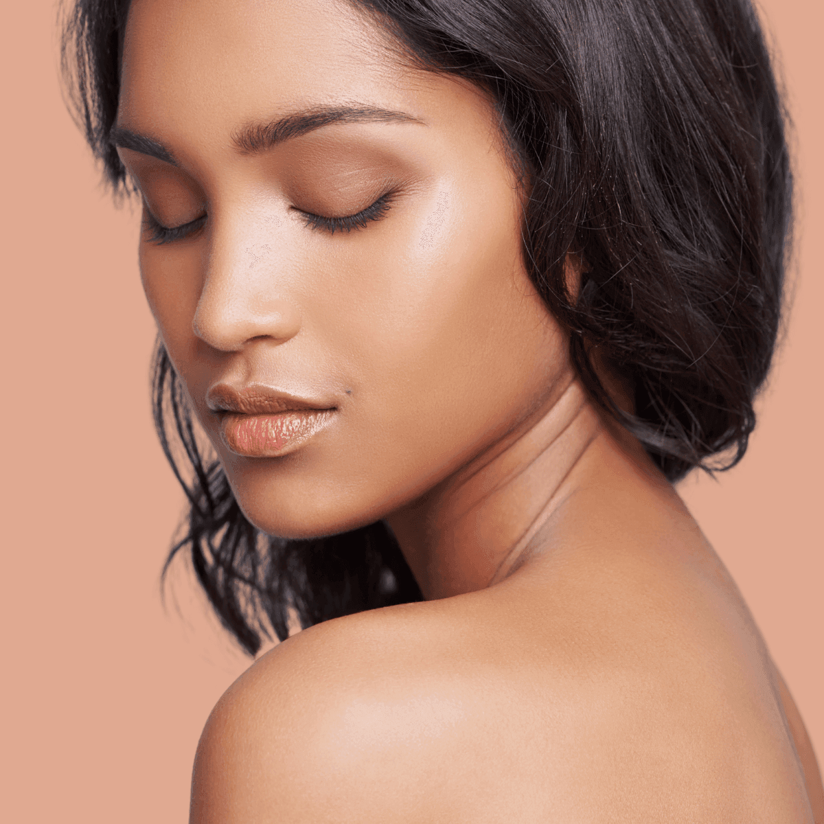 woman with glowing youthful looking skin 