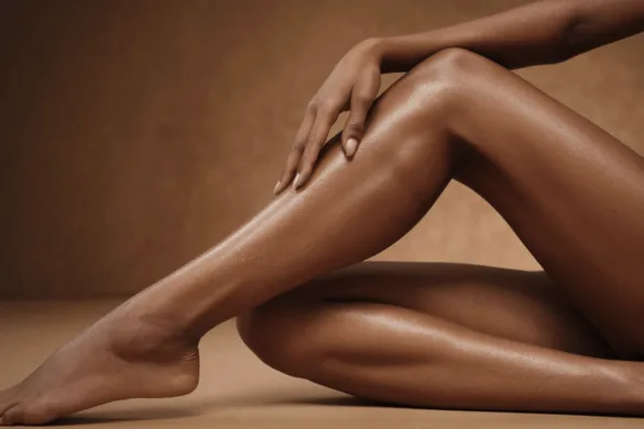 A photo of woman dark skin legs with smooth skin