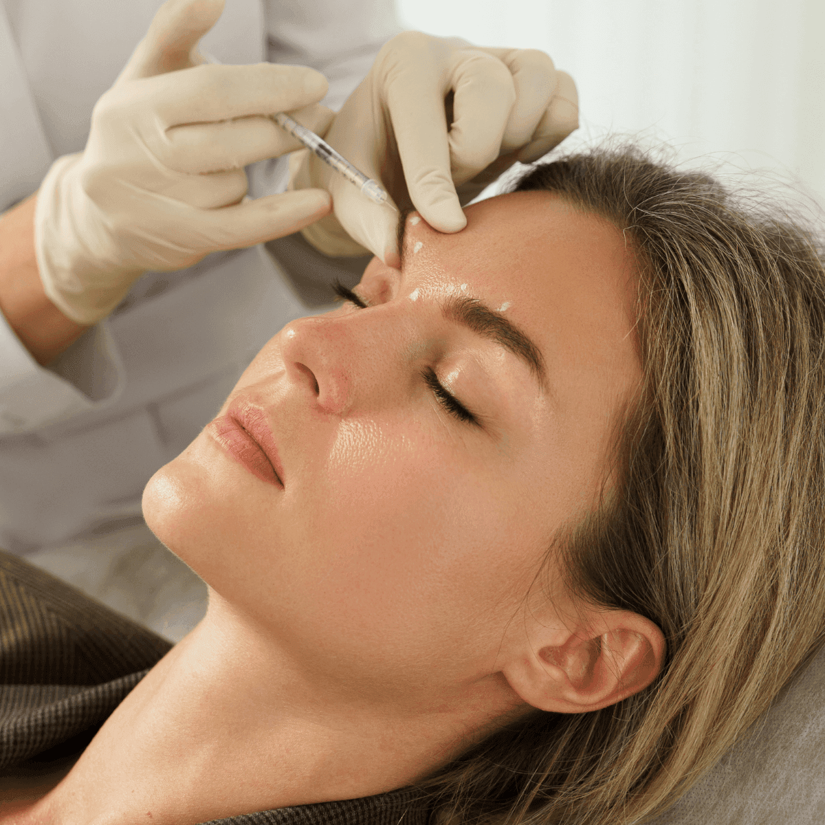 woman getting fillers injected