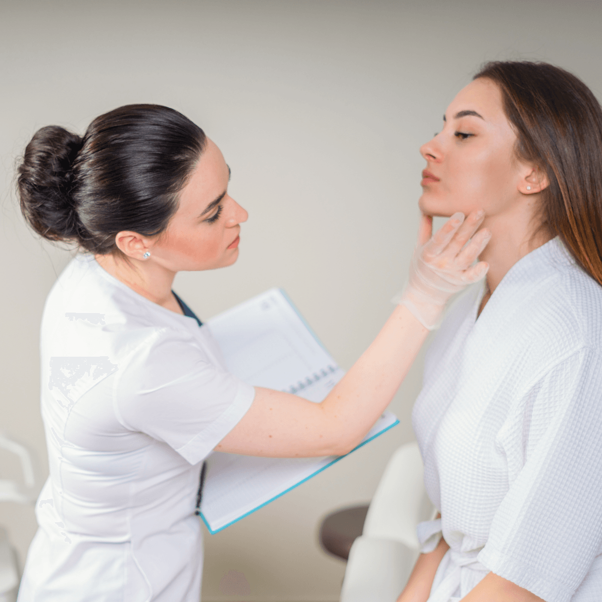a dermatologist consulting her patient