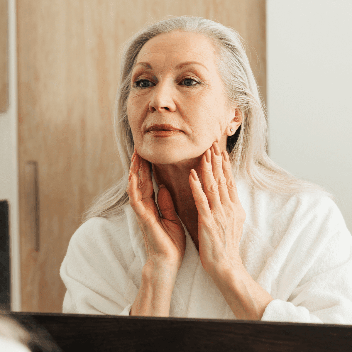 older woman experiencing skin laxity