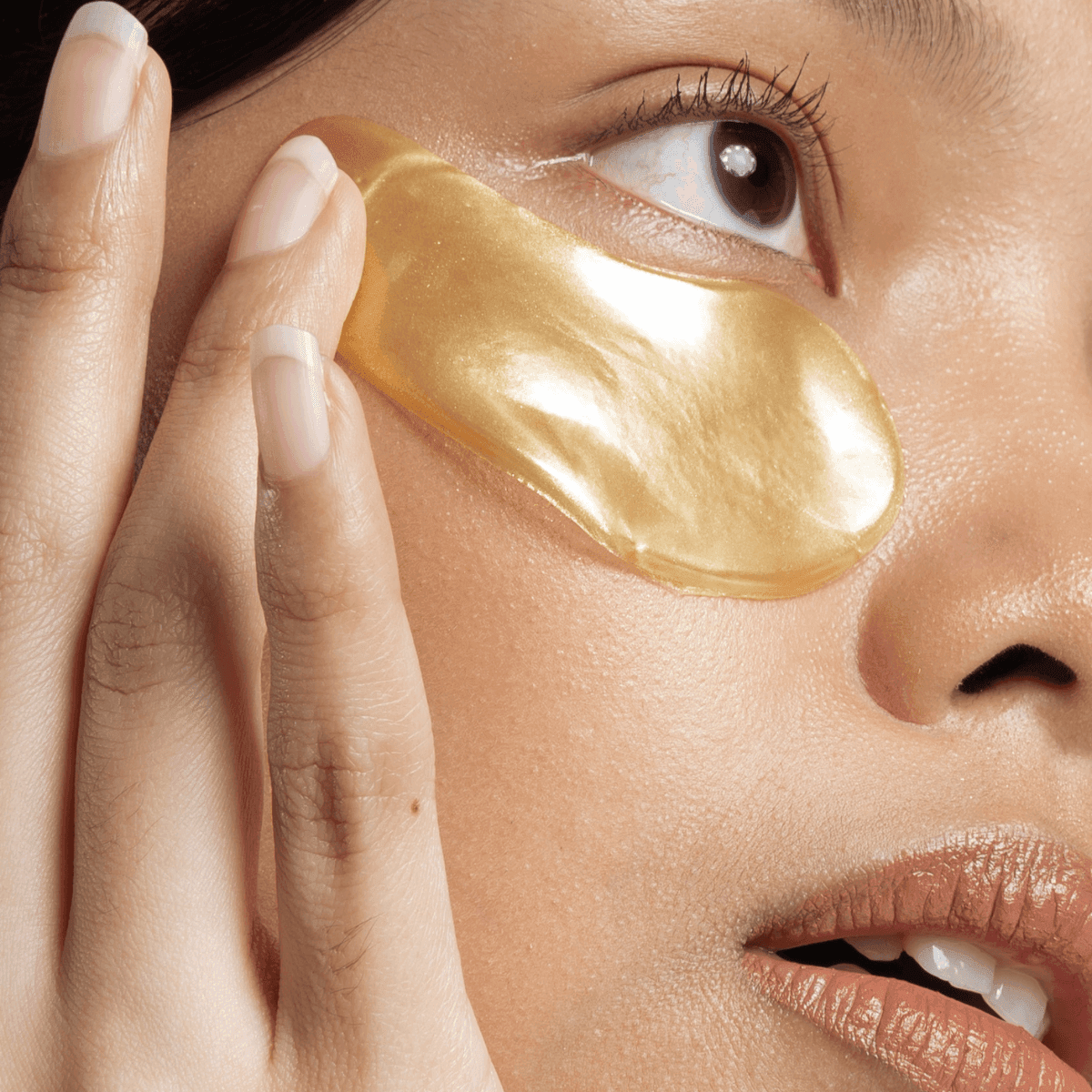 woman with cosmetic eye patches